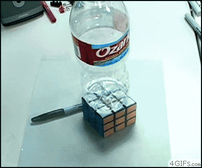Rubiks-cube-bottle-illusion.gif